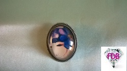 Broche La Femme à la fleur bleue